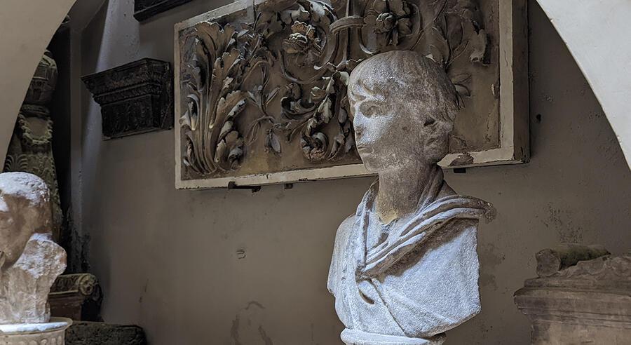 A bust of Polydukes on a pedestal in the Sepulchral Chamber.