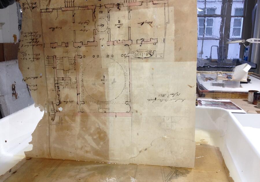 Drawings being separated through humidification and bathing.