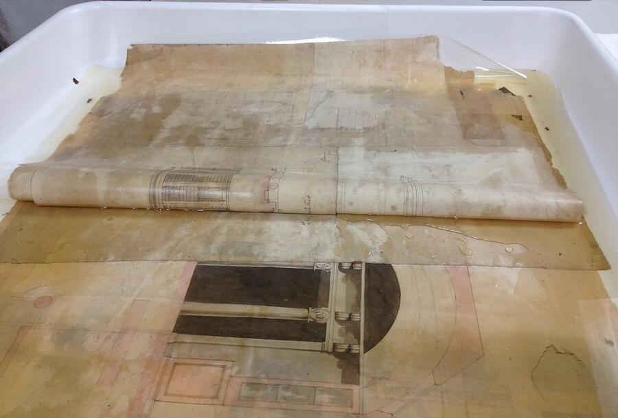 Drawings of the Bank of England emerging from the layers of paper, previously hidden within the framed Gandy work.