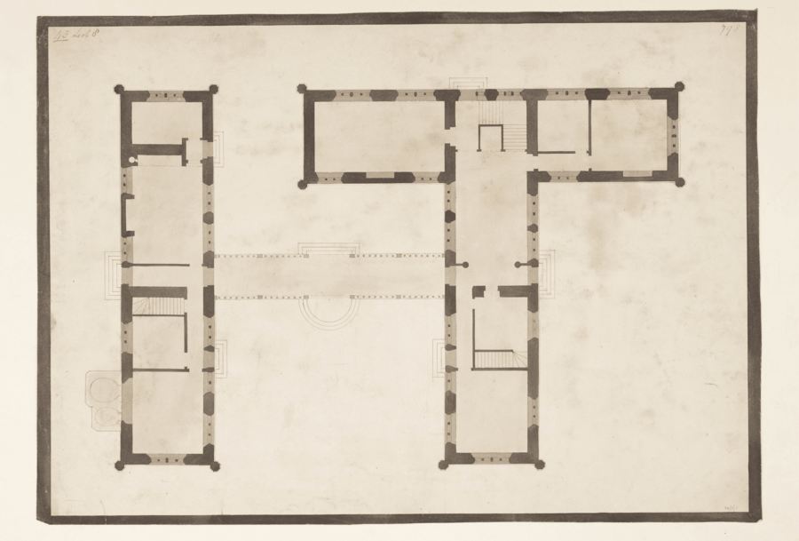 lack and white architectural floor plan of a building shaped like an uppercase "T". The drawing features thick black lines outlining walls and rooms. Three main wings extend from a central corridor. Stairs and doorways are marked, showing internal circulation and access points. No color or text is present