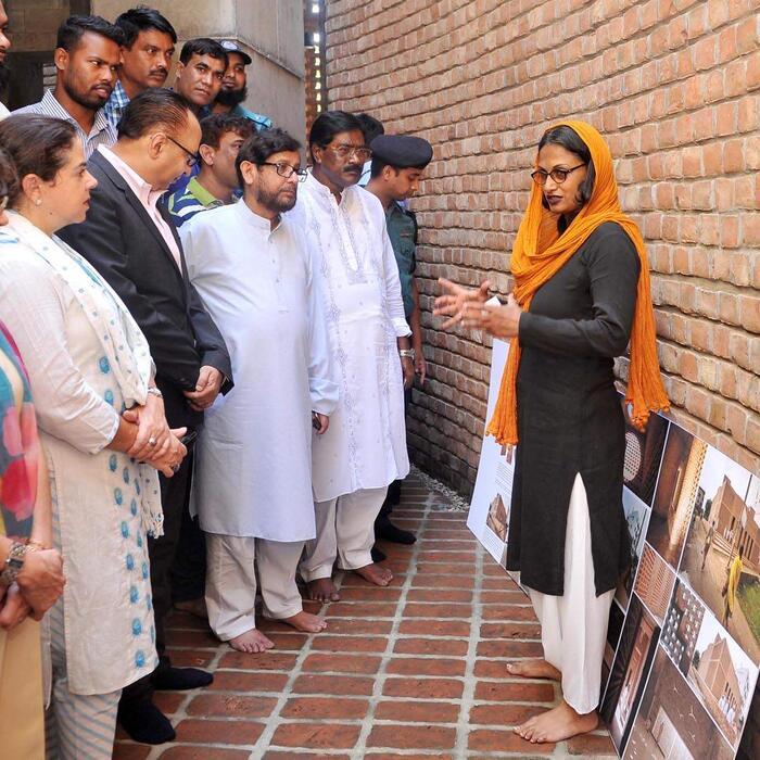 Marina Tabassum discusses the Bait ur Rauf mosque with event attendees.