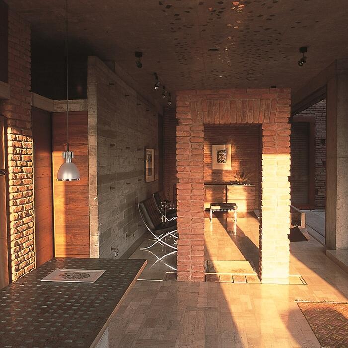 Evening light illuminates the interior of an apartment.