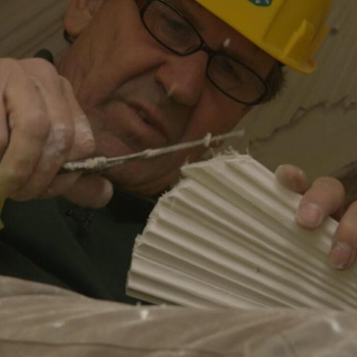 Neil England cutting a lath