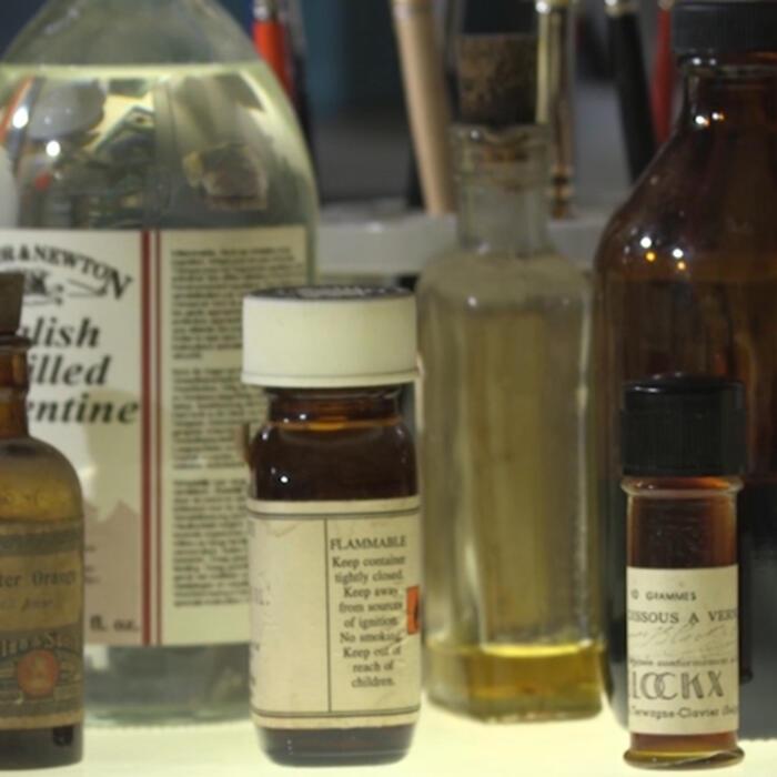 Bottles of turpentine and other bindings