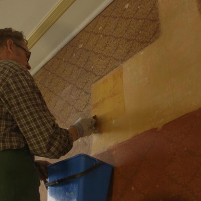 Removing the top layers of paint and paper