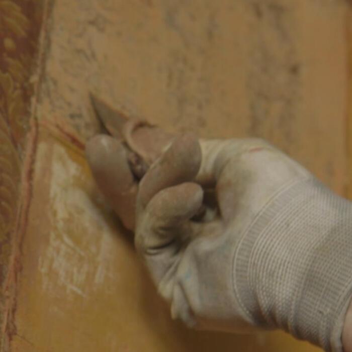 Scraping paint layers from the original wallpaper