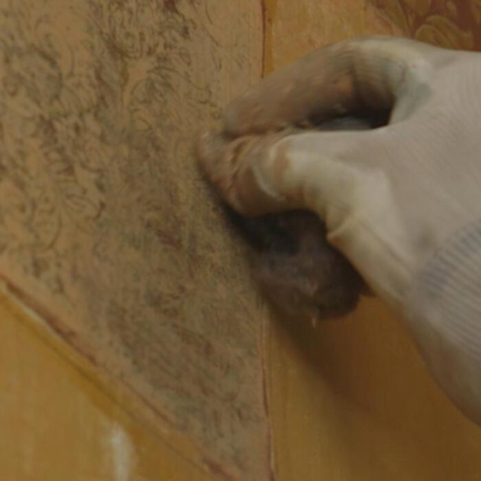 Using wire wool to remove the last remnants of paint