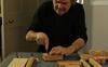 Dieter Coellen cutting a block of cork