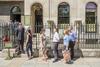 Photograph of visitors being greeted at the gate of the Soane Museum and other visitors waiting in the queue