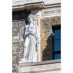 A statue, based on the Greek 'Caryatids' in Athens, high on the facade of the Soane Museum