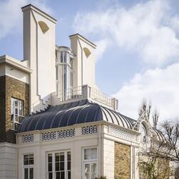 The twin chimney stacks of Cosmic House.