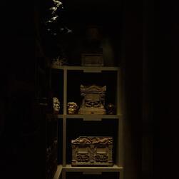 In the Museum's catacombs, cinerary urns, skulls and sculpture entwine to create a foreboding and shadowy corner.