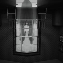 Haunting mirrored reflections in monochrome turn Eliza's bedchamber upside down.