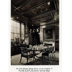 A photo from 1925, showing the Library-Dining Room at Sir John Soane's Museum. The dining table is set up for afternoon tea, and there are flowers in the large ornamental vases by the window.