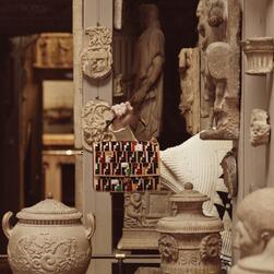 A woman holding a handbag in the Dome Area