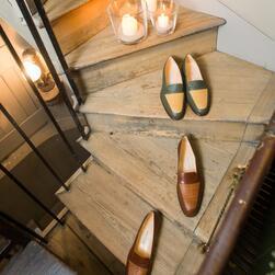 Men's shoes on a staircase