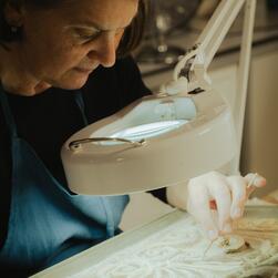 Jane Wilkinson, Head of Conservation, restoring a cast.