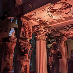 The illuminated columns and sculptures of the Colonnade.