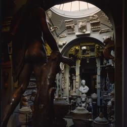The Dome area facing East, from behind the large plaster cast of Apollo Belvedere, who is in shadow.