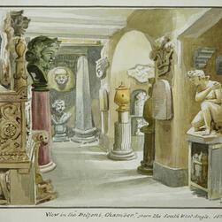 view of the basement West Corridor looking north, showing the Egyptian head in position