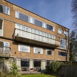 The rear elevation of 2 Willow Road, as seen from the garden, showing all four stories of the house.