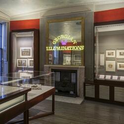 The exhibition galleries, complete with neon Georgian Illuminations signage.