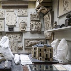 The walls of the Office are decorated with casts of architectural features.