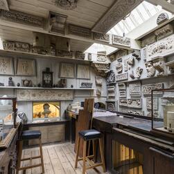 The walls of the Office are decorated with casts of architectural features.